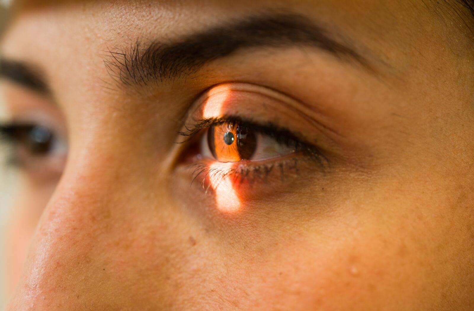 A person is going through an eye exams.
